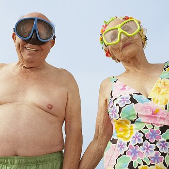 old couple wearing bathing outfit